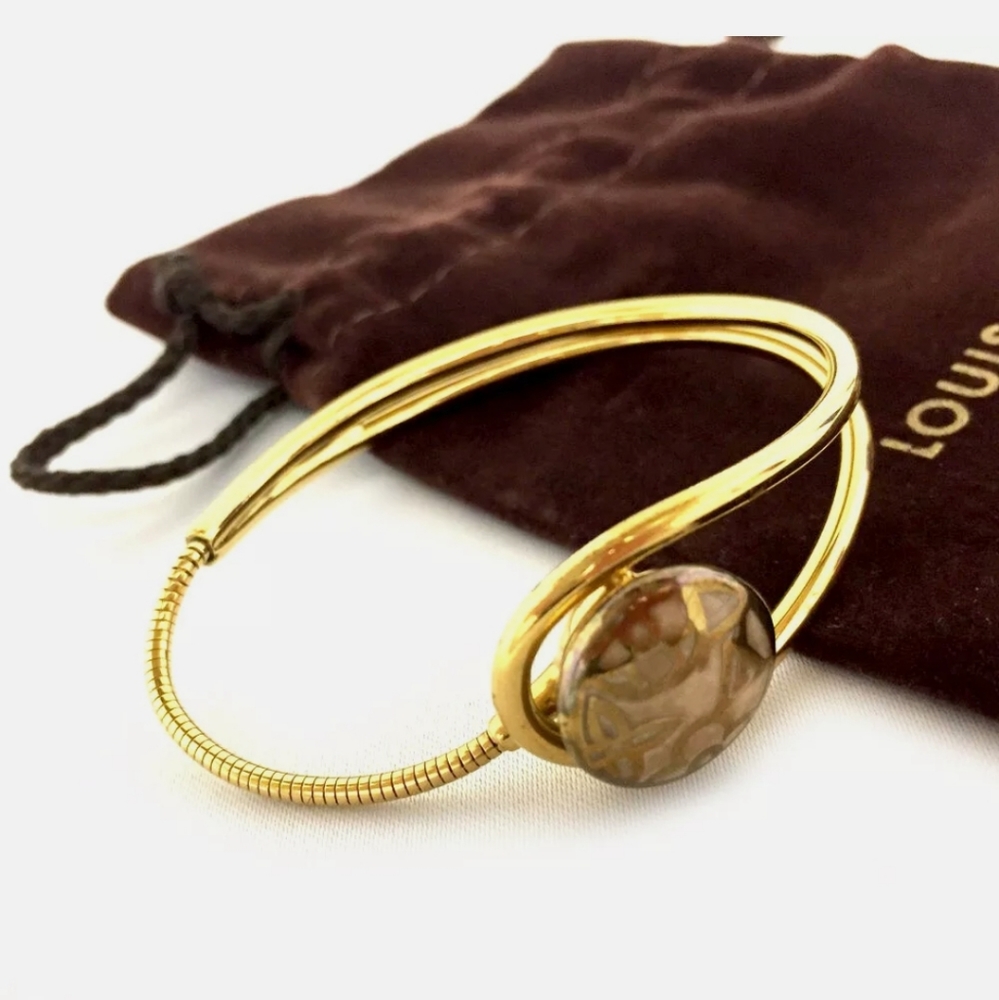 LOUIS VUITTON CELESTE MAGNET GOLD TONE BRACELET - Picture 11 of 16